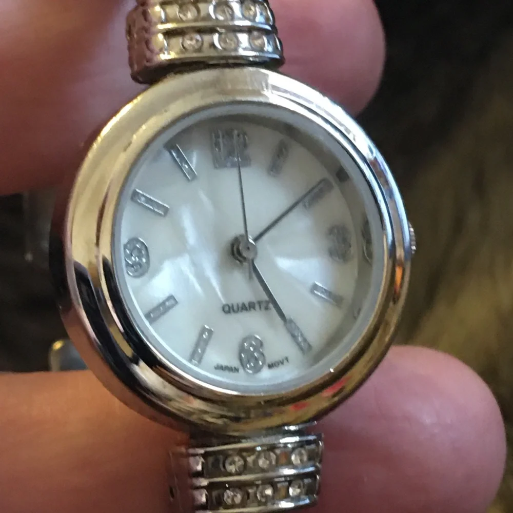 Ladies shiny silver rhinestone accent cuff watch